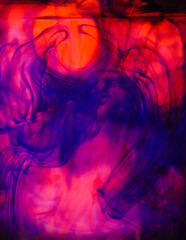 Coloured Inks dropped into water creating magical art and patterns as they mix together