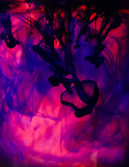 Coloured Inks dropped into water creating magical art and patterns as they mix together