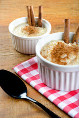 Pot with rice pudding - sprinkled with cinnamon