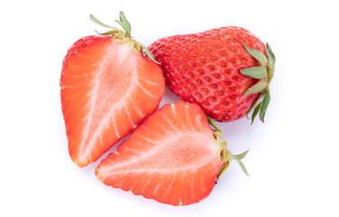 One ripe strawberry and two halves on a white background, isolated, top view