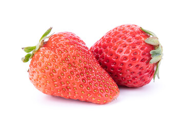 Two whole ripe strawberries on a white background, isolated