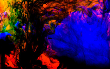 Coloured Inks dropped into water creating magical art and patterns as they mix together