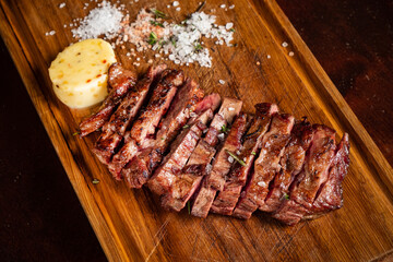 Beef Steak on wooden board.