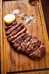 Beef Steak on wooden board.