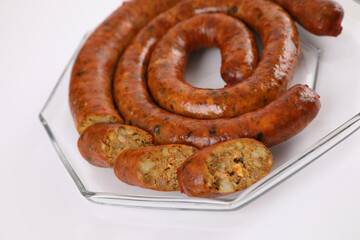 Local Northern Thai food , Northern Thai spicy sausage street food isolated in white background