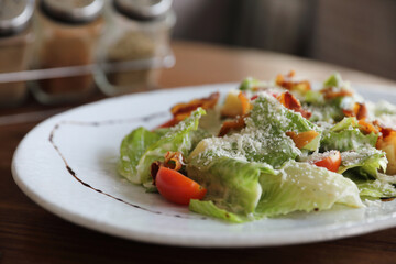 caesar salad appetizer on wooden background