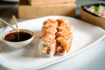 sushi with soy sauce in restaurant