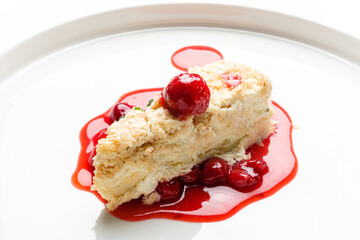 napoleon cake with cherry sauce and mint