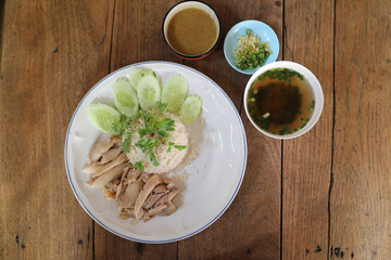 Thai food gourmet steamed chicken with rice on wood background