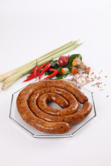 Local Northern Thai food , Northern Thai spicy sausage street food isolated in white background