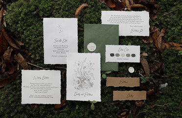 A set of wedding invitations in boho style with calligraphy. Postcard, envelope and card on wedding...