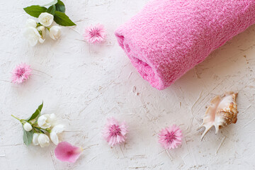 Fototapeta na wymiar Towel and bath accessories on a white background.