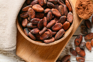 Bowl with cocoa beans, closeup