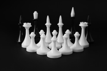 Chess pieces on dark background