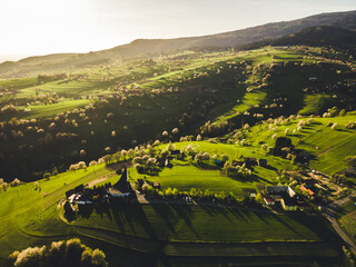 Spring landscape in Slovakia. Polana region, Hrinova. Green spring rural hills landscape, fields, flowering trees, organic farming © Zedspider