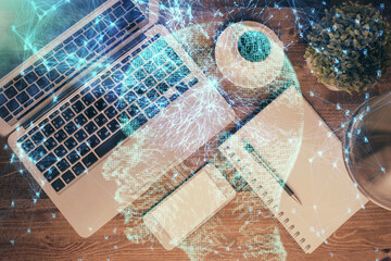 Double exposure of brain drawing hologram over topview work table background with computer. Concept of big data.