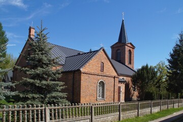 Fototapeta na wymiar view of the brick Mariavite church from 1907 in Peplowo, Poland 