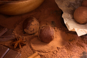 Homemade chocolate Truffles and ingredients. Cocoa dessert making