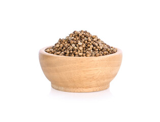 Coriander seeds on white background