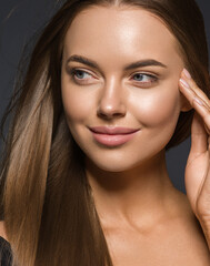 Obraz premium Beautiful woman long brunette smooth hair healthy skin natural make up beautiful smile