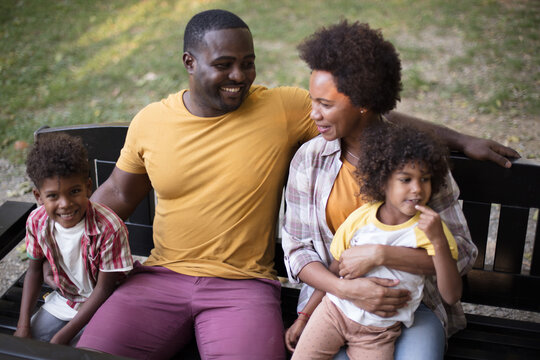 One happy family.  Portrait of happy African American family outdoors.
