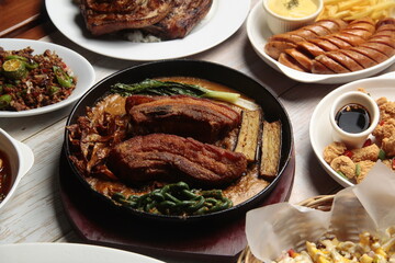 Filipino food called Kare Kare or meat and vegetables cooked in savory thick peanut sauce