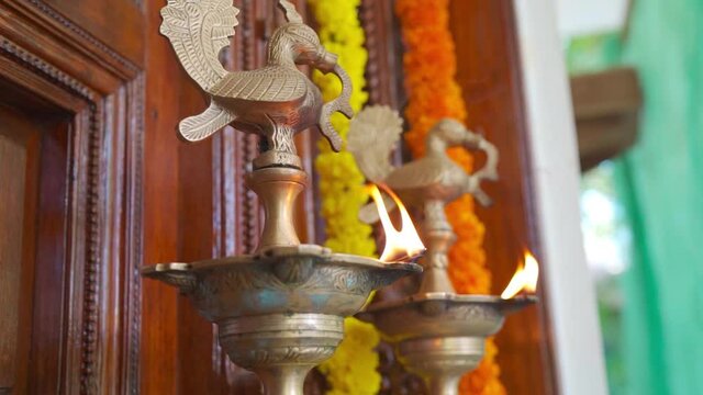 Close up of Twin lantern Diwali deepam. Two traditional Indian light lamp lit. Indian traditional festival bright diyas.