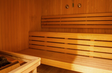 Natural wooden interior of sauna room in spa center
