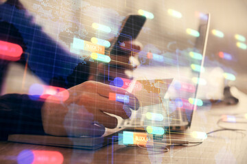 Fototapeta premium Multi exposure of man's hands holding and using a digital device and data theme drawing. Innovation concept.