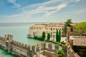 Obraz premium View from Rocca Scaligera Castle of The picturesque town of Sirmione on Lake Garda. Province of Brescia, Lombardia, Italy.