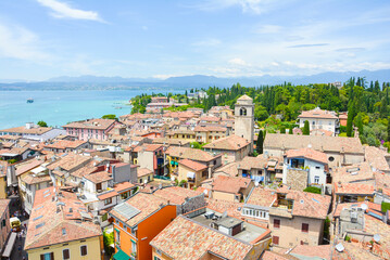 Fototapeta na wymiar View from Rocca Scaligera Castle of The picturesque town of Sirmione on Lake Garda. Province of Brescia, Lombardia, Italy.