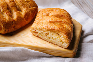 Closeup on fresh baked puffs with cheese filling