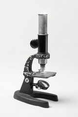 Old microscope for inspection and analysis of defects.Microscope, is an optical device for displaying a small subject at a higher magnification.