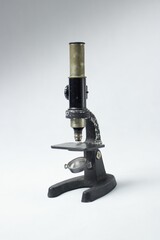 Old microscope for inspection and analysis of defects.Microscope, is an optical device for displaying a small subject at a higher magnification.