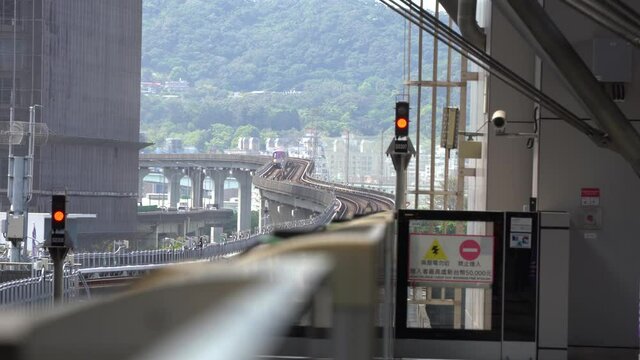 Passenger commuter train arriving to the station Taiwan efficient Railways Public Transportation system.