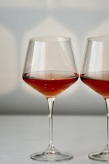 two glasses of red wine