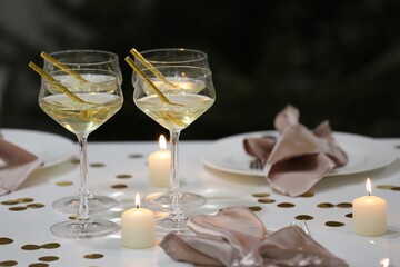 evening table setting with champagne in a restore
