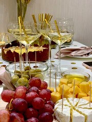 glass of wine and grapes in a celebrant's