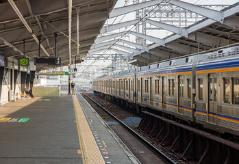 Fototapeta na wymiar OSAKA, JAPAN - MAR 29, 2020: NANKAI Express Train at Shin-Imamiya Station. The rail transport system of Nankai Main Line connects Osaka to Wakayama.