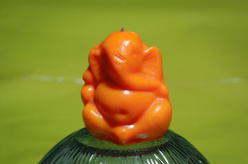 A small statue of Lord Ganesha made of wax