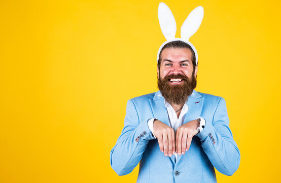 easter bunny man. happy easter. bearded man wear bunny ears. Egg hunt. spring holiday celebration. funny male hipster. brutal man having fun. mature male wear rabbit ears