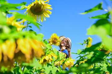 Nice flowers. happy childrens day. childhood happiness. portrait of happy kid with beautiful...