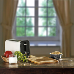 Fototapeta na wymiar White toaster on table and free space for your decoration 