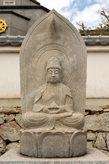 Stone statue of Maitreya Bodhisattva at Taifuku-ji temple in Kobe, Hyogo, Japan