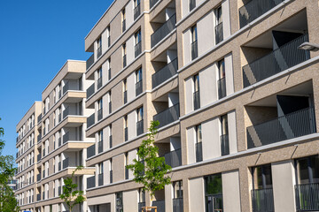 Modern beige multi-family apartment buildings in Berlin, Germany