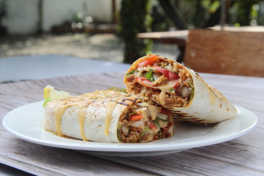 Pork burritos on a plate
