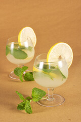 Cocktail drink-orange juice fresh juice with strawberry with lemon orange, mango, pineapple, apple, grapes isolated on white background. High-resolution image