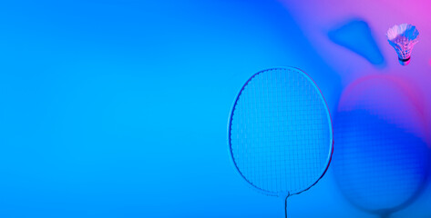 Badminton racket and shuttlecock in vibrant bold gradient holographic neon colors