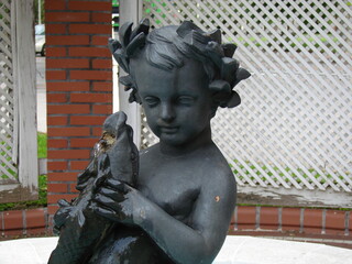 A Fountain With The Sculpture of a Child