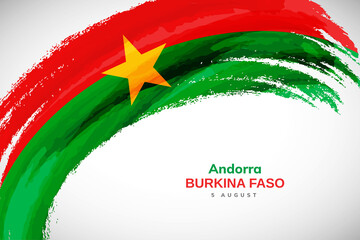 Happy independence day of Burkina Faso with watercolor brush stroke flag background with abstract watercolor grunge brush flag